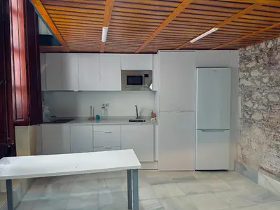 Una cocina o zona de cocina en Apartamentos Arraez