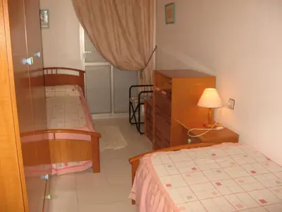 Cama o camas de una habitación en Apartamento 3 habitaciones -50 metros playa