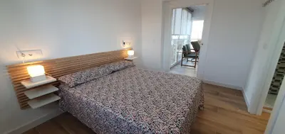 Cama o camas de una habitación en Balcón Playa Delicias