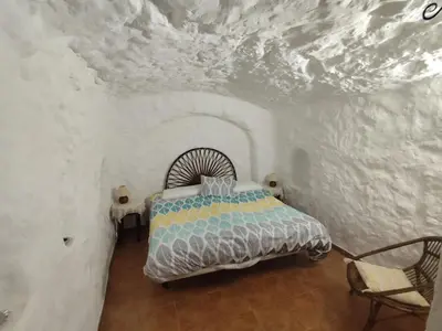 Cama o camas de una habitación en Cuevas del Sol