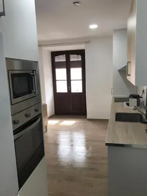 Una cocina o zona de cocina en Alojamiento Wadi Dar Al-Farah II 