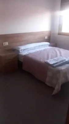 Cama o camas de una habitación en Casa La Cruz Pintá