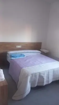 Cama o camas de una habitación en Casa La Cruz Pintá