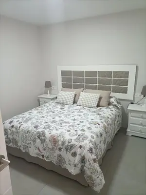 Cama o camas de una habitación en Paradise of Dreams Apartamentos - MAREA APARTAMENTO