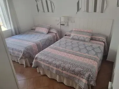 Cama o camas de una habitación en Apartamento Cerca de la Playa