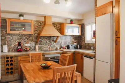 Una cocina o zona de cocina en Casa Mary R&R