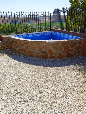 Piscina en o cerca de Casa Cueva Maite