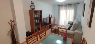 Una televisión o centro de entretenimiento en bonito apartamento en aguadulce