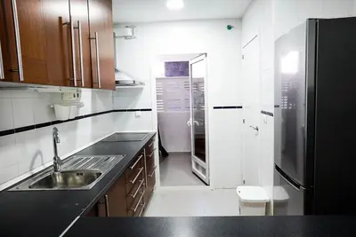 Una cocina o zona de cocina en Bonito apartamento ideal para familias con piscina en Roquetas