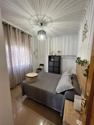 Cama o camas de una habitación en PISO Guadix MB