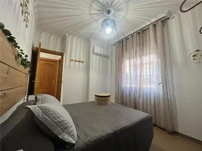 Cama o camas de una habitación en PISO Guadix MB