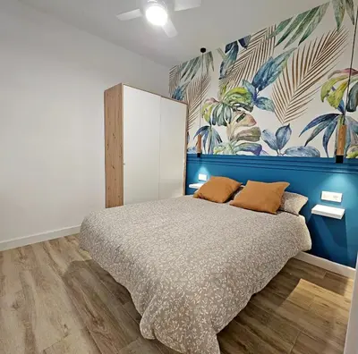 Cama o camas de una habitación en Elegante apartamento de diseño.