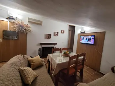 Una televisión o centro de entretenimiento en Casa de la Luz