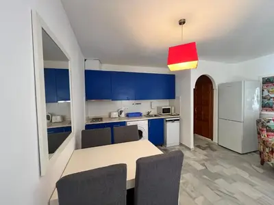 Una cocina o zona de cocina en Luna Dorada Vera Playa- bajo