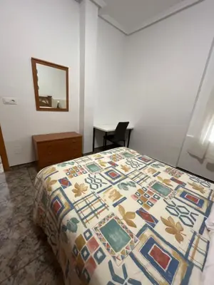 Cama o camas de una habitación en Bonito apartamento cerca de la playa