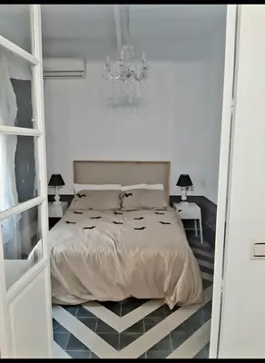 Cama o camas de una habitación en Casita de pescadores