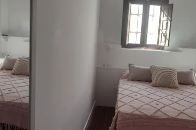 Cama o camas de una habitación en Tu casa