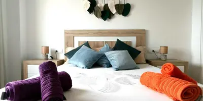 Cama o camas de una habitación en Ático en Vera a 200m de la playa