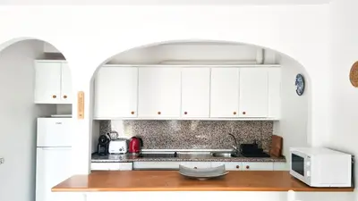 Una cocina o zona de cocina en Garden vistas. Hermoso dúplex con patio, solárium y piscina.