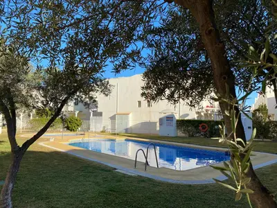 Piscina en o cerca de Garden vistas. Hermoso dúplex con patio, solárium y piscina.