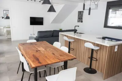 Una televisión o centro de entretenimiento en Bajo con patio, Calle Cañada Aguilar 10