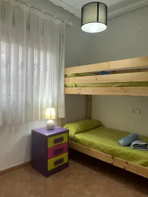 Cama o camas de una habitación en Golf & Beach Apartment
