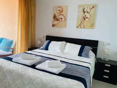 Cama o camas de una habitación en SUNRISE ATALAYA Amanecer suite