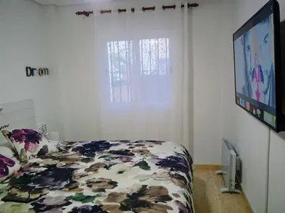 Cama o camas de una habitación en Bajo con porche en primera línea En Vera, Almeria