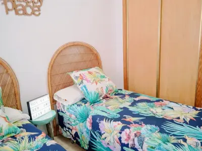 Cama o camas de una habitación en Bajo con porche en primera línea En Vera, Almeria