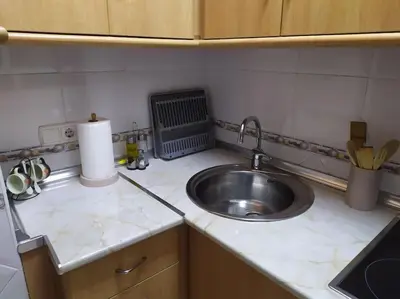 Una cocina o zona de cocina en Acogedor Apartamento frente al mar Elena y Michele