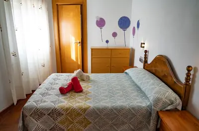 Cama o camas de una habitación en HOSTAL CACHE