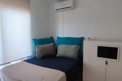 Cama o camas de una habitación en Estudio en Envía Golf Bello Rincón Paz y Vistas