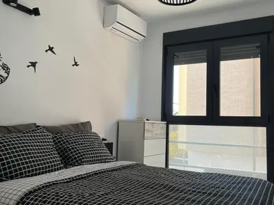 Cama o camas de una habitación en Apartamento en Roquetas de Mar.