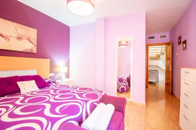 Cama o camas de una habitación en Playa de Levante, Céntrico y Parking - by Aloha Palma