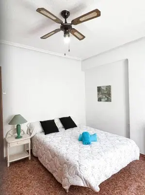 Cama o camas de una habitación en Apartamento Junto al Mar