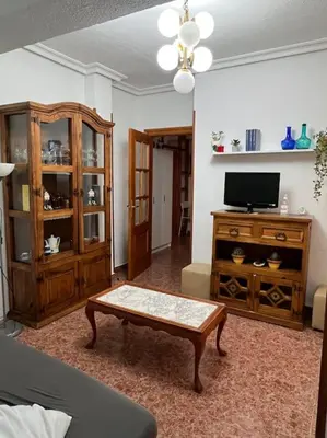 Una televisión o centro de entretenimiento en Apartamento Junto al Mar