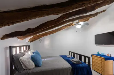 Cama o camas de una habitación en Rambla Retreats Apartment Azul with shared pool & hot tub in Oria