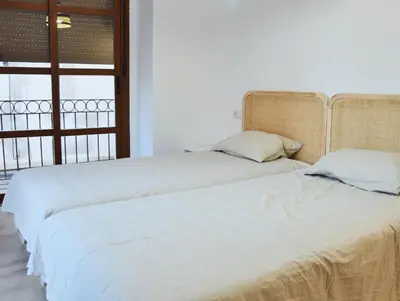 Cama o camas de una habitación en La Colegiata Suite