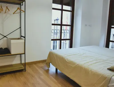 Cama o camas de una habitación en La Colegiata Suite
