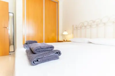 Cama o camas de una habitación en TrendyHomes Aguadulce Playa