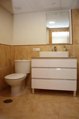Un baño de Palami Vera con terraza, WIFI 300mb, piscina y garaje privado