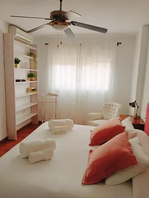 Cama o camas de una habitación en Casa familiar al lado de la playa