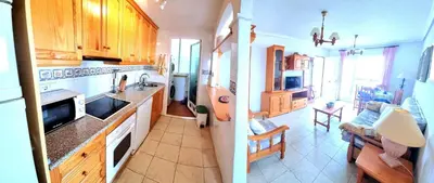 Una cocina o zona de cocina en Ático 1ª línea de playa dos dormitorios Veramar 4 Vera playa