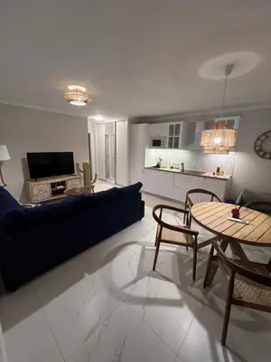Una televisión o centro de entretenimiento en Apartamento Capi Premium Vera Costa