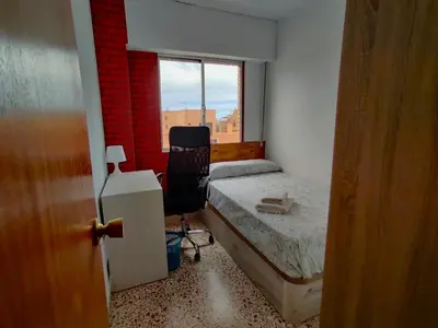 Cama o camas de una habitación en Piso cerca Playa con 2 duchas y 5 Aires Acondicionados