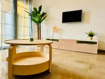 Una televisión o centro de entretenimiento en AquaHome- Precioso apartamento con piscina, 3 minutos a pie de Vera Playa