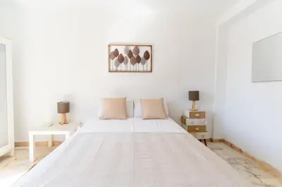 Cama o camas de una habitación en TrendyHomes San Sebastián