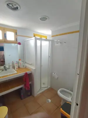 Un baño de Apartamento El Palmeral 1ª línea