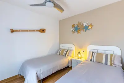 Cama o camas de una habitación en Apartamento Buenavista Playa Blue R&R