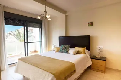 Cama o camas de una habitación en Vera Almería - Mar y Piscinas